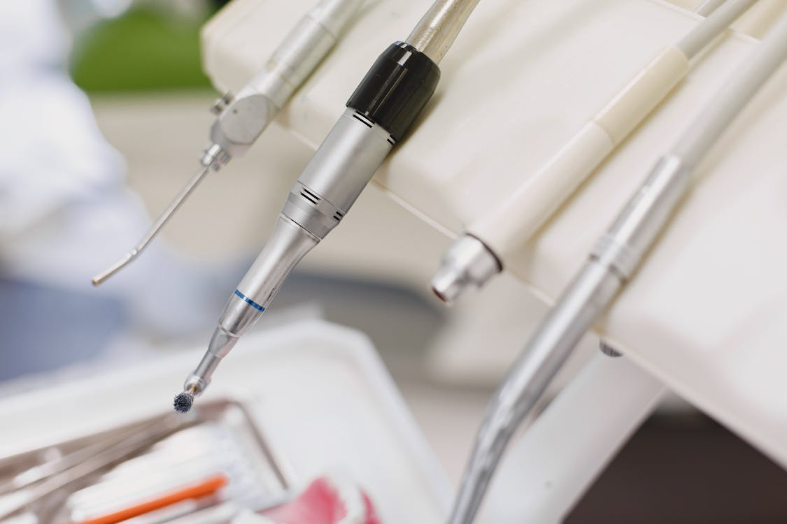 Dentist providing urgent care for a patient in dental pain