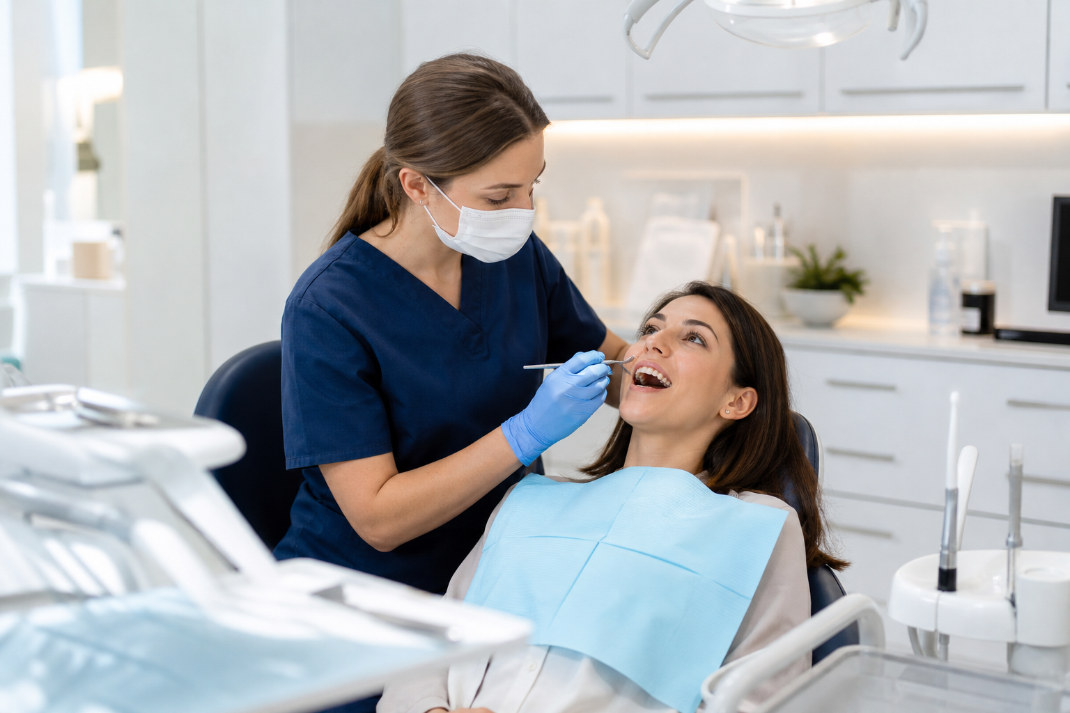 Dentist examining a patient during a checkup